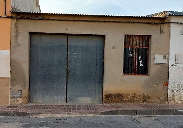 Garage 4 voitures avec petit patio