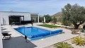 Bijna nieuwe villa met 3/4 slaapkamers, zwembad, dubbele garage en berging in Alicante Dream Homes Castalla 